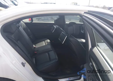 2013 BMW 740Li xDrive z USA, uszkodzony, nr VIN WBAYF4C5XDD127995